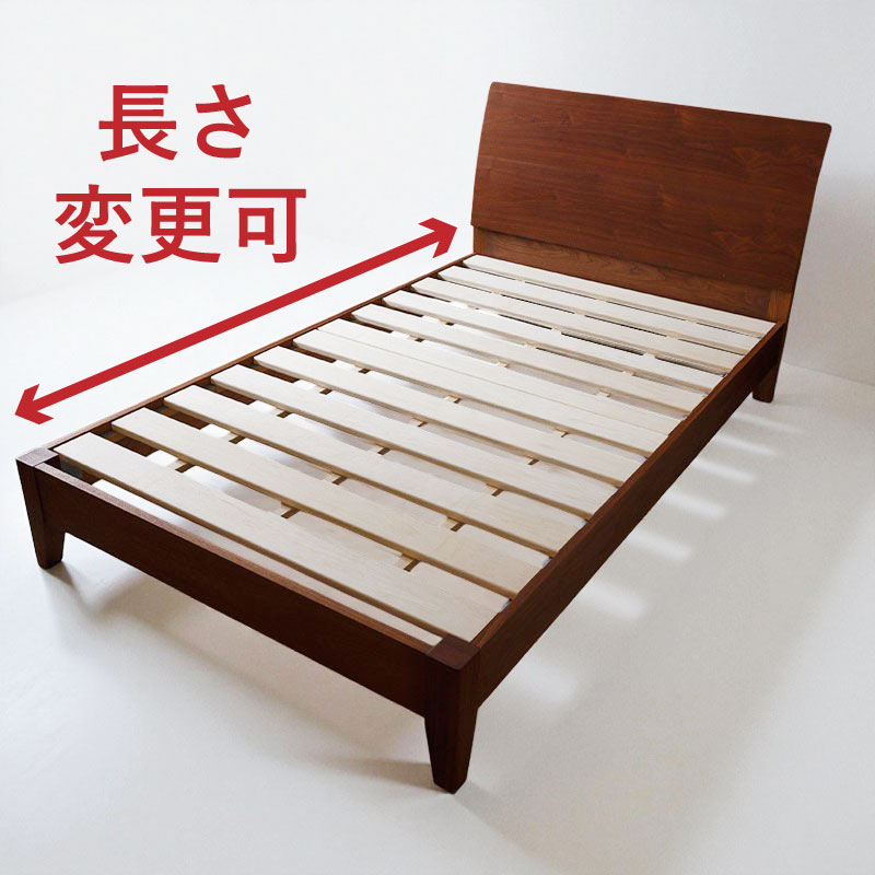 弧を描くベッドフレーム